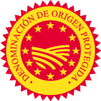 El logotipo de la «denominación de origen protegida» es un círculo rojo y amarillo. El centro representa un campo rodeado de doce estrellas. La mención «denominación de origen protegida» rodea las estrellas. 