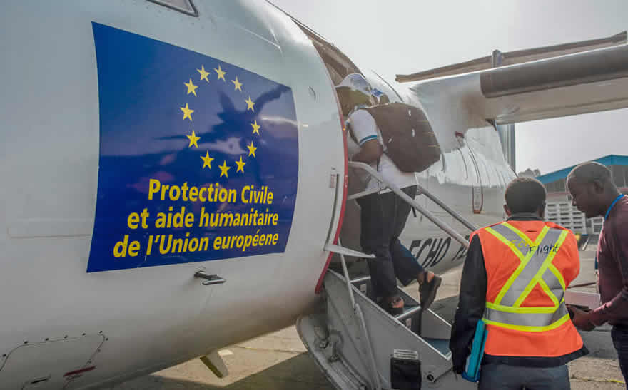 Image: Aid workers board an EU ECHO plane to deliver humanitarian assistance to the Democratic Republic of the Congo during its 10th Ebola outbreak.  © European Union